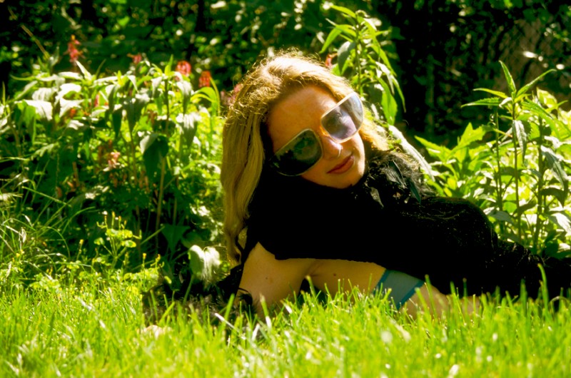 Dara wearing Blue Sunglasses, © Margaret Schnipper, photographer